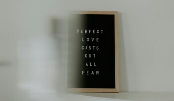 brown wooden frame with quote